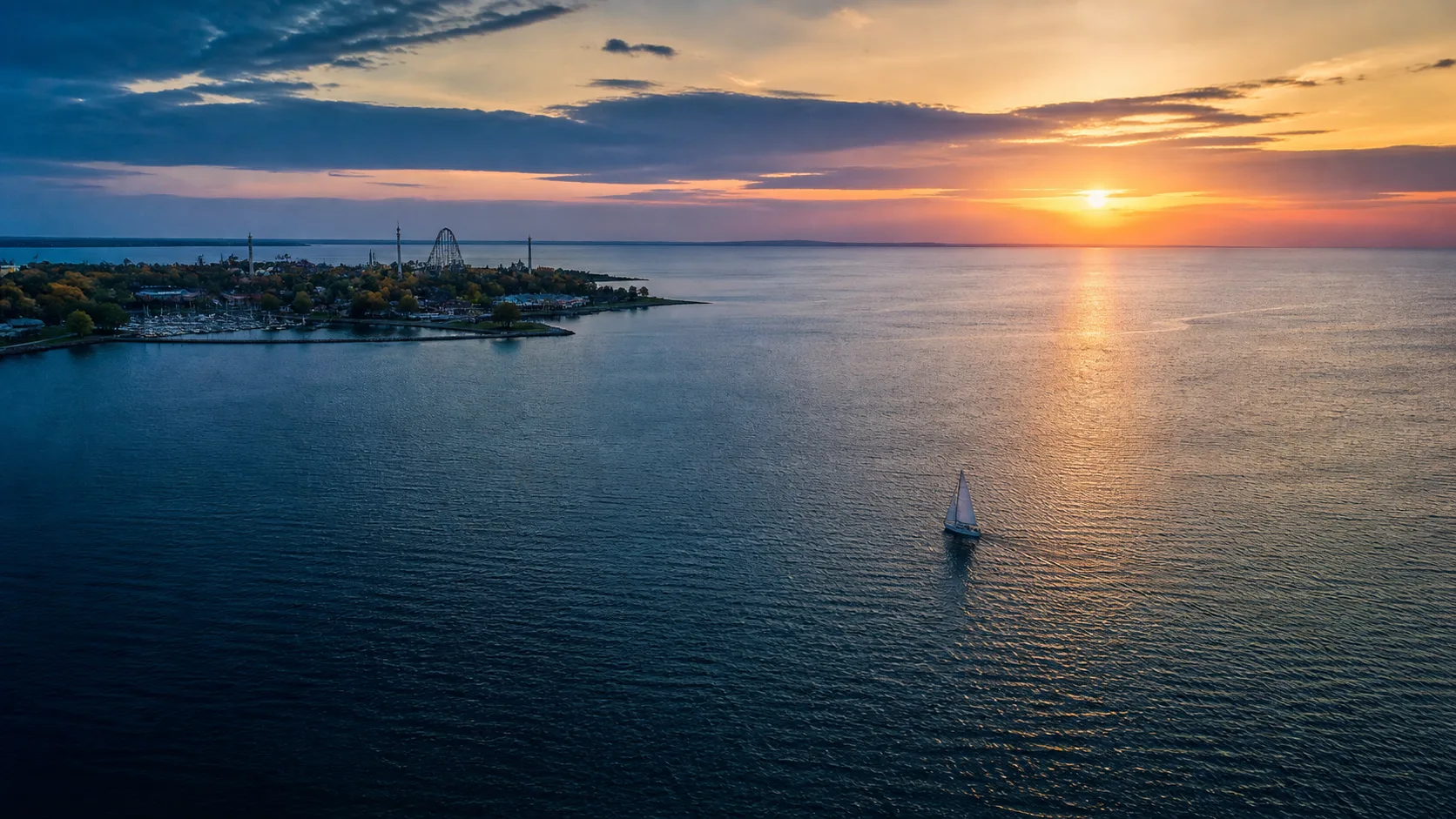 Illustrative aerial view inspired by Sandusky Bay at sunset